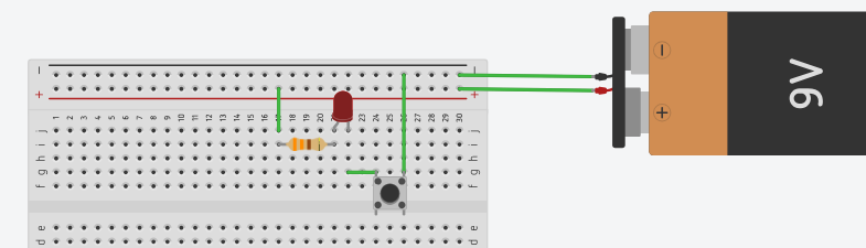 Montage LED commandée par bouton-poussoir sur breadboard, circuit fermé et LED allumée